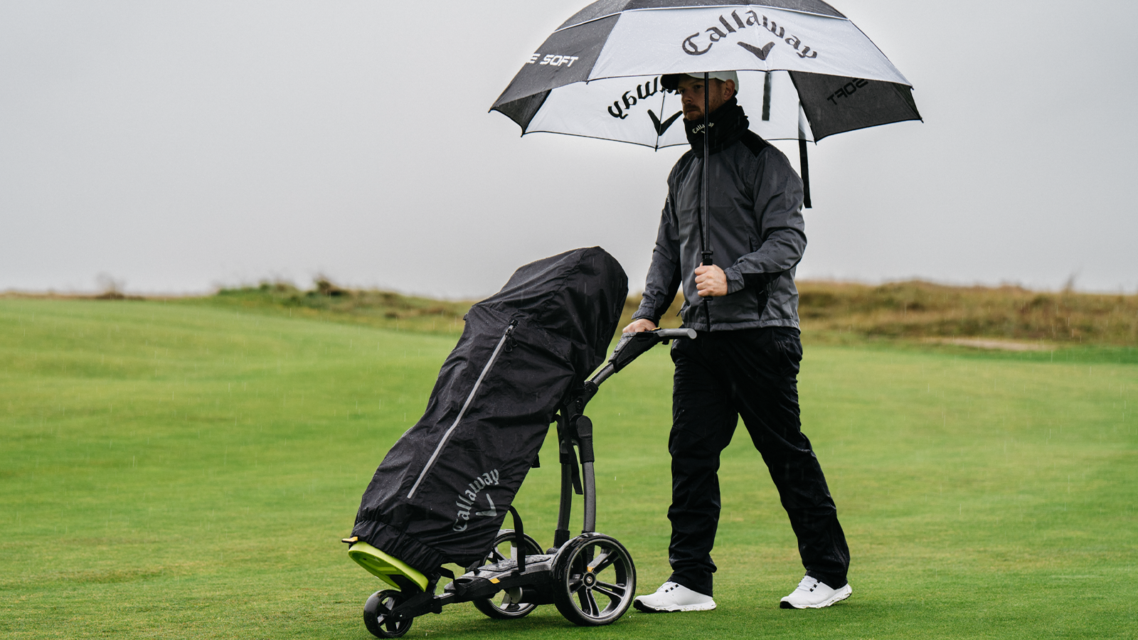 Winter golf accessories including umbrellas